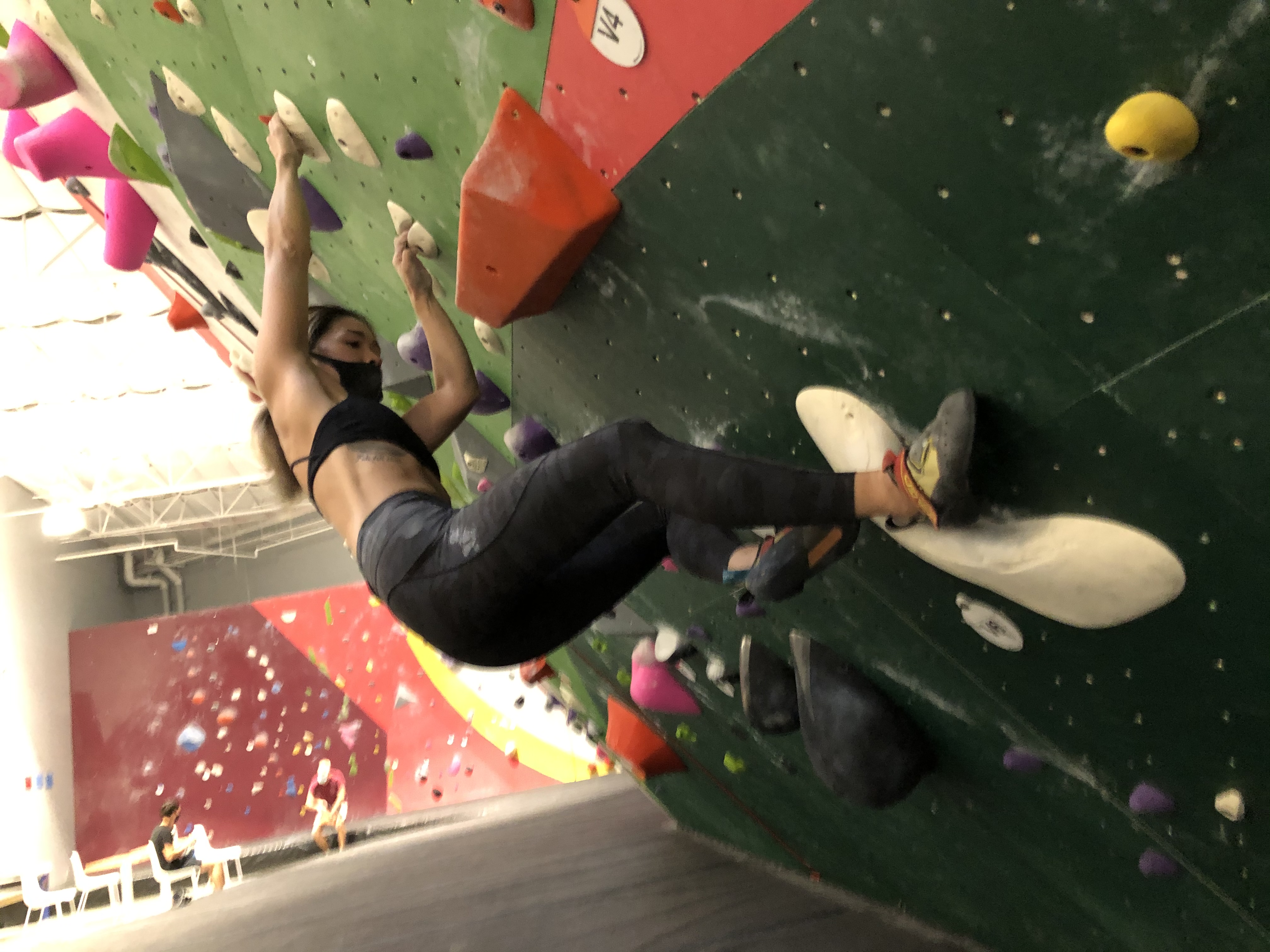 Climbing in her Scarpa Dragos